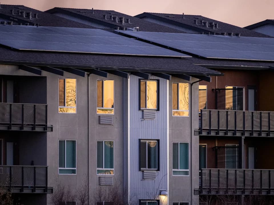Solar array across the roof of a multi-storey building